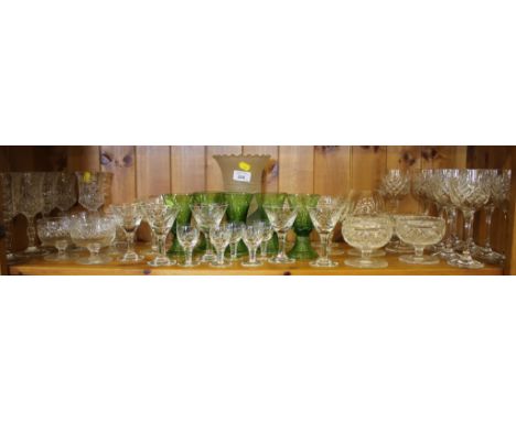 A set of five German green glass wine glasses, a frosted glass vase and various cut drinking glasses