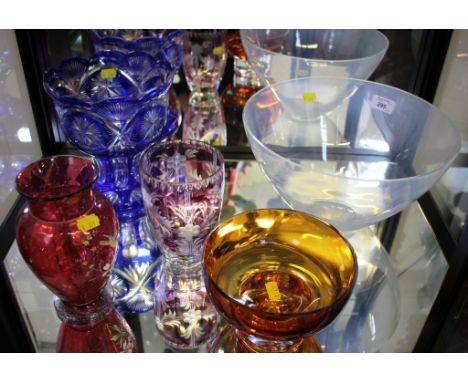 Large vaseline blue glass style vase, together with four other glass vases of different colours (two as found)