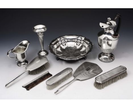 A FIVE PIECE SILVER MOUNTED DRESSING TABLE SET consisting of a mirror, hairbrush and comb, two clothes brushes, a silver pose