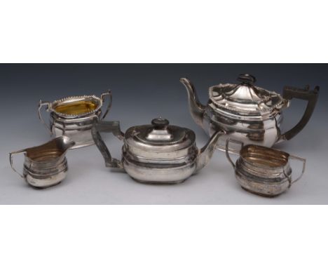 A SILVER THREE PIECE TEA SET, oval shaped teapot with domed hinged lid, ebonised handle with matching finial, sugar basin and