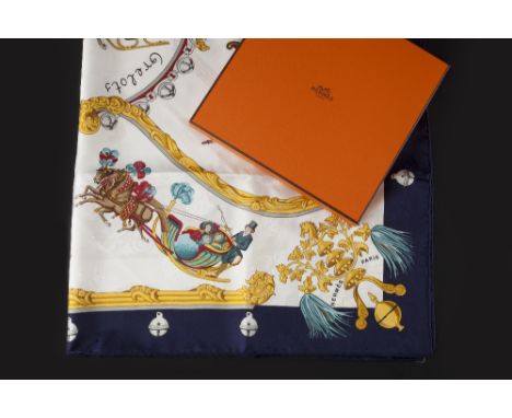 A 'PLUMES ET GRELOTS' SILK SCARF BY HERMÈS, depicting horse-drawn carriages, in shades of blue, yellow and white, signed to b