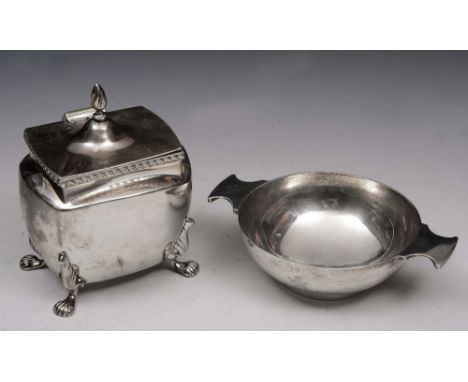 A LATE VICTORIAN SILVER TEA CADDY, oval shaped with a domed hinged lid with a flame finial and standing on four cabriole legs