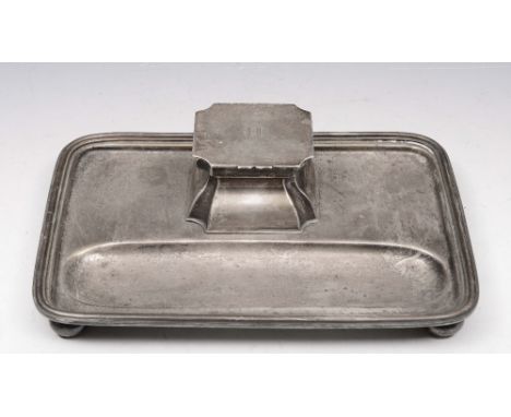 A GEORGE V SILVER DESK STAND, rectangular shaped with reeded border, single inkwell with glass liner, 20.5cm wide, Birmingham