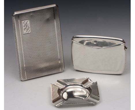 A SILVER PURSE OR CALLING CARD CASE in the form of a clutch bag, 9.5cm wide, Birmingham 1918 by T Simpson & Son; a rectangula