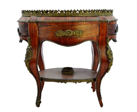 A 19th century French table top gilt metal mounted Kingwood oval jardiniere on cabriole supports, united by platform undertie