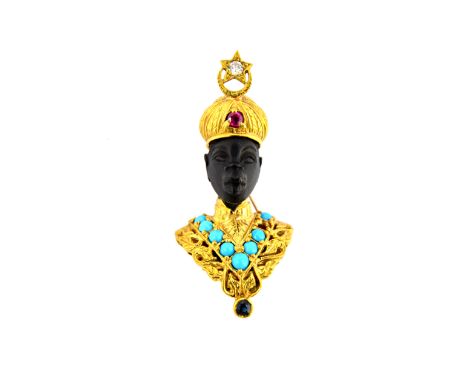 An 18ct gold, diamond, ruby, sapphire and turquoise set brooch, designed as the bust of a Blackamoor wearing ceremonial attir