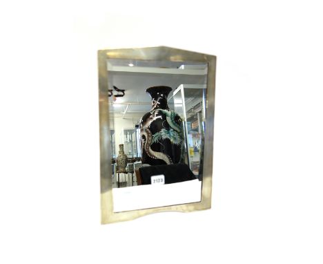 A silver mounted oak strut backed shaped rectangular dressing table mirror, decorated with engine turned borders, Birmingham 