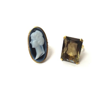 A 9ct gold ring, mounted with an oval banded agate cameo, carved as the portrait of a lady, ring size N and a 9ct gold ring, 