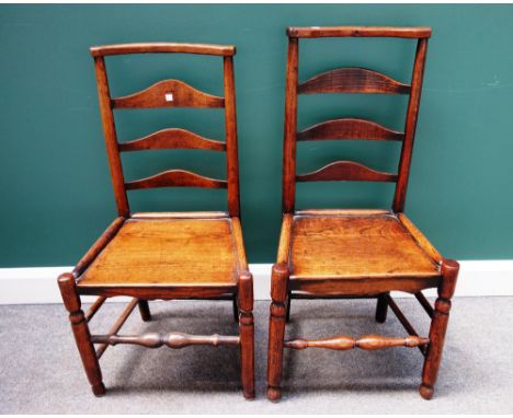 A matched set of six George III ash and elm ladder back dining chairs, on turned supports. (6)