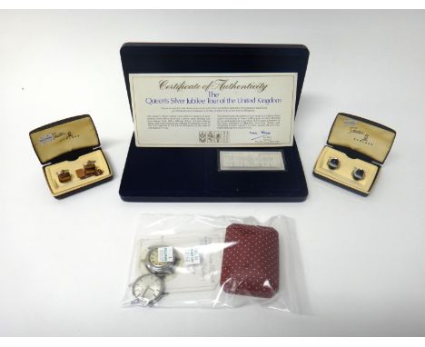A 9ct gold neckchain and a gold St Christopher pendant, combined weight 4.2 gms, a pair of silver gilt cufflinks with a match