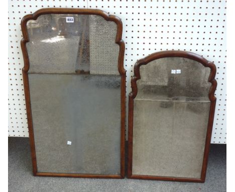 An early 18th century style walnut framed arch top wall mirror, with double mirror plate, 46cm wide x 84cm high, together wit