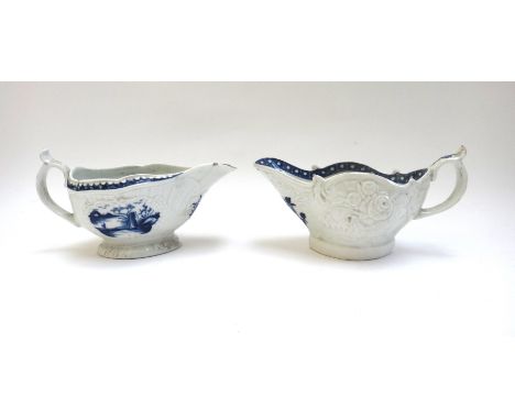 Two Worcester blue and white sauceboats, circa 1765, the first painted with the `Fisherman and Billboard Island' pattern, the
