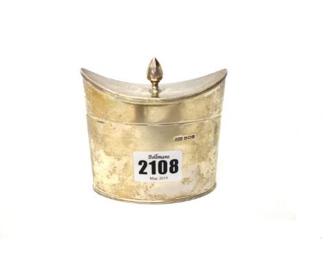 A silver hinge lidded tea caddy, the cover of dished form with a faceted finial, with reeded borders, otherwise plain, Sheffi
