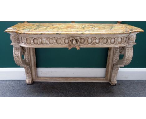 A 19th century console table, the faux painted marble top over a carved cream painted base, on a pair of scroll supports, 103