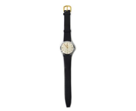 A gentleman's circular steel cased Tudor wristwatch, the signed circular silvered dial, with gilt Arabic and arrow shaped num