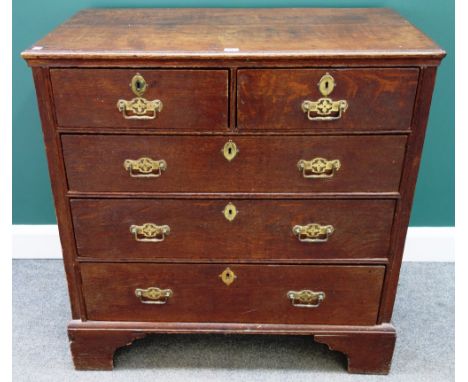 A mid 18th century oak chest of two short and three long graduated drawers on bracket feet, 95cm wide. 