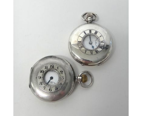 A gentleman's silver cased, keyless wind, half hunting cased pocket watch, the jewelled lever movement detailed Lagaros Swiss