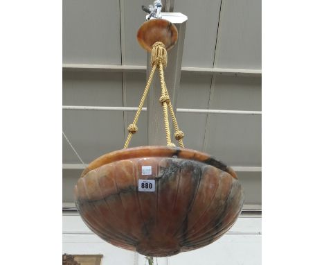 An alabaster dish light, late 19th century, of lobed circular form, suspended on three later gilt ropes, 40cm diam. 