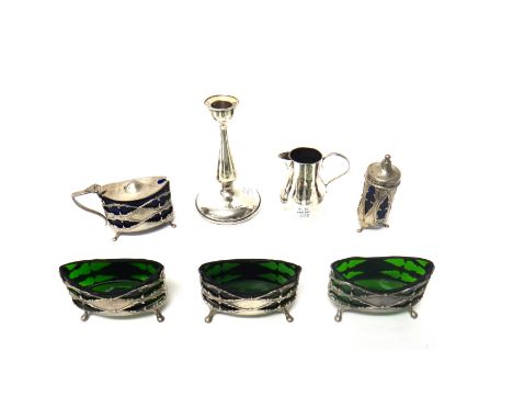 Silver and silver mounted wares, comprising; three boat shaped salts, having green glass liners, a mustard pot and a pepperet