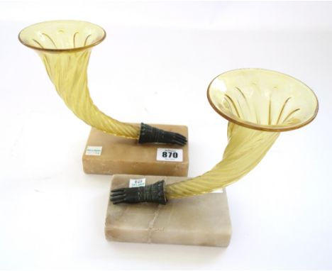 A pair of cornucopia shaped yellow glass vases, with bronze glove finials on alabaster plinths, 12.5cm high, and a pair of pa
