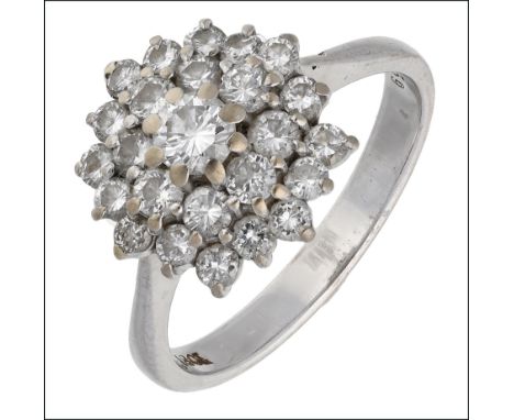 A diamond cluster ring, 1970s, of tiered design, set throughout with brilliant-cut diamonds, white precious metal mounted, sh