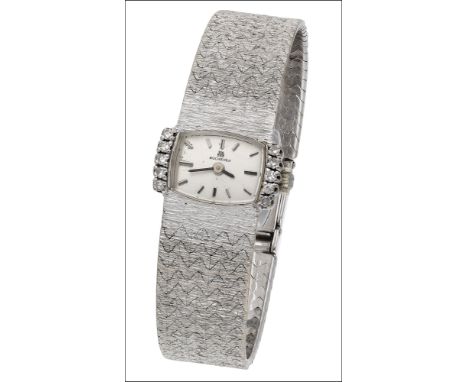 Bucherer, A lady’s white gold and diamond-set bracelet watch, circa 1960 Movement: manual winding, 17 jewels Dial: silvered, 
