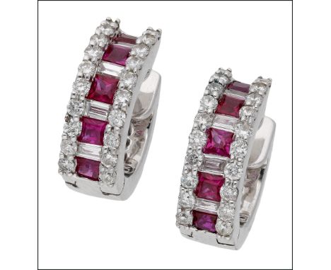 A pair of ruby and diamond ear hoops, the hinged hoops channel set to the  front with alternate calibré-cut rubies and diamon