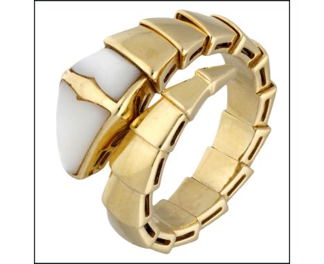 A mother-of-pearl ‘Serpenti’ ring by Bulgari, the sprung body of polished tapered links, to a stylised head inlaid with mothe