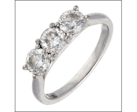 A three stone diamond ring, the brilliant-cut diamonds in crossover claw setting, 18ct white gold mounted, sponsor’s mark ‘CJ