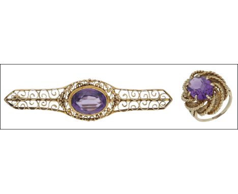 An amethyst set ring and brooch, the ring centred with an oval mixed-cut amethyst within a whorl ropetwist textured mount, st
