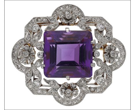 An amethyst and diamond brooch/pendant, the step-cut amethyst within openwork cartouche-shaped surround with floral and folia