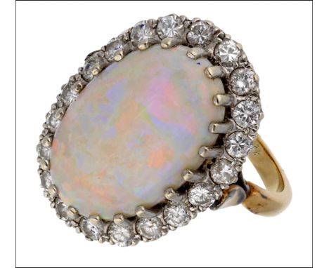 An opal and diamond cluster ring, the oval cabochon opal claw set within a surround of brilliant-cut diamonds, total diamond 