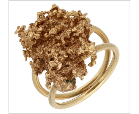 A dress ring, designed as a gold nugget, on a polished bifurcated hoop, ring size O.  £120-£150