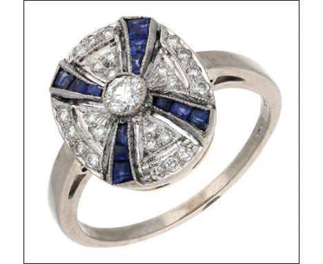 A sapphire and diamond dress ring, the pierced panel set with brilliant-cut diamonds and calibré-cut sapphire-set saltire, mo