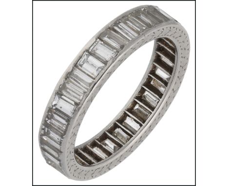 A diamond eternity ring, set with a continuous row of baguette-cut diamonds, total diamond weight approximately 1.60 carats, 