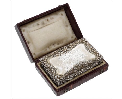 An early Victorian silver rectangular snuff box by Nathaniel Mills, the hinged cover edged by chased floral borders, with cen