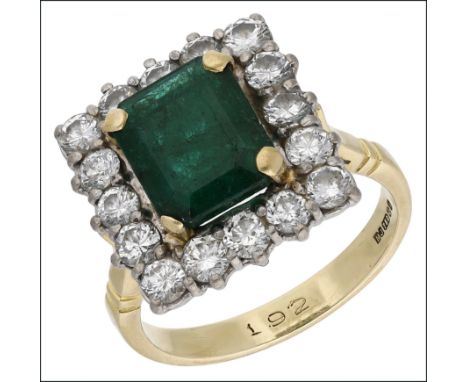 An emerald and diamond cluster ring, set with a step-cut emerald within a surround of brilliant-cut diamonds, mounted in 18ct