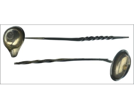 Two silver coin inset toddy ladles with twist whalebone handle, the single lipped example hallmarked for London 1801, maker’s