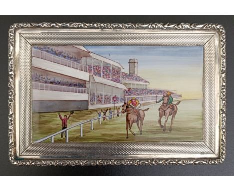 A silver and enamel box, the cover decorated a horse racing scene, Birmingham 1976, 4.7 ozt (all in), 9 cm wide