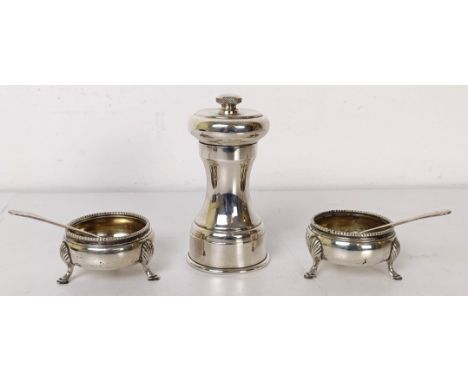 A pair of Victorian silver salts, and a silver coloured metal pepper grinder (3)