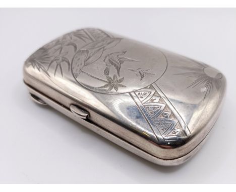 A Victorian silver cigarette case, with Aesthetic period decoration, inscribed, London 1860, 2.2 ozt (all in), 9 cm&nbsp; hig
