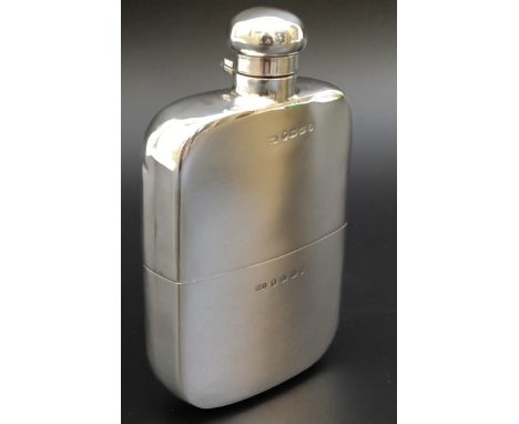 A Victorian silver hip flask, Birmingham 1889, 6.9 oztLid doesn't secure down flush but is secure, slight play in the hinge b