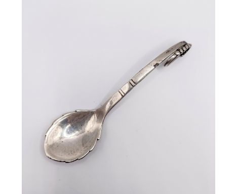 A Georg Jensen sterling silver spoon, with a shaped bowl21.g, 12 cm long, marks clear, some surface wear, no major faults fou