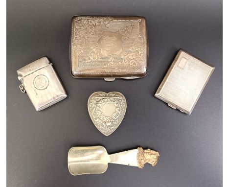 A silver cigarette case and two vestas, 4.3 ozt, a silver plated heart shaped box, and a silver plated caddy spoon (5)