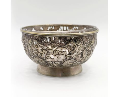 A Chinese export silver coloured metal bowl, with pierced decoration and glass liner, 2.4 ozt, 8 cm diameter