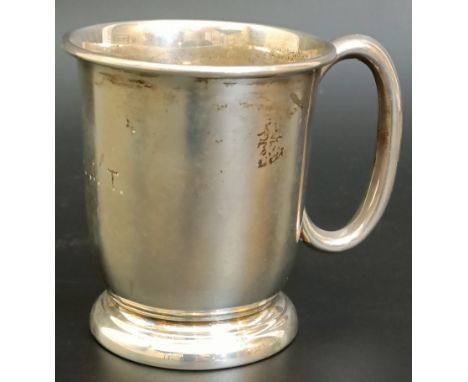 A silver christening mug, initialled, Sheffield 1947, 3.5 ozt, 7.5 cm high