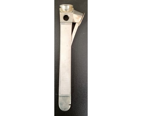 A silver cigar cutter, with engine turned decoration, import marks for London 1965, 4.2 ozt (all in)