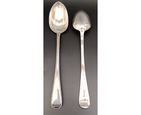 A pair of Victorian&nbsp;silver bead pattern basting spoons, London 1872, 10.6 ozt (2)
