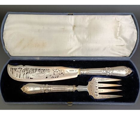 A pair of Victorian silver fish servers, crested, London 1860, casedNo obvious signs of repairs, hallmarks match,  some light