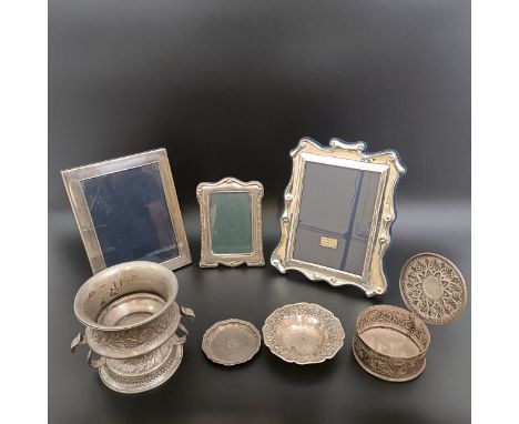 A Chinese silver coloured metal dish, 11.5 cm, three silver photograph frames, and other items